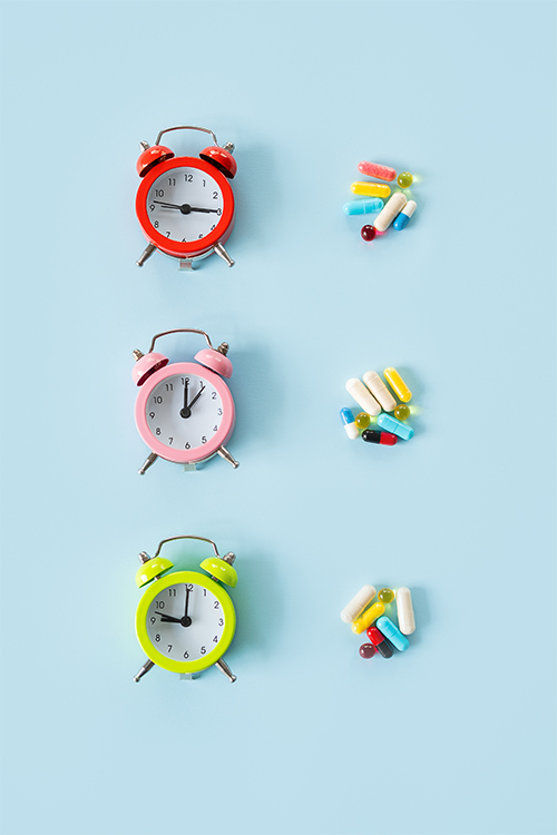 Image of clocks and medication